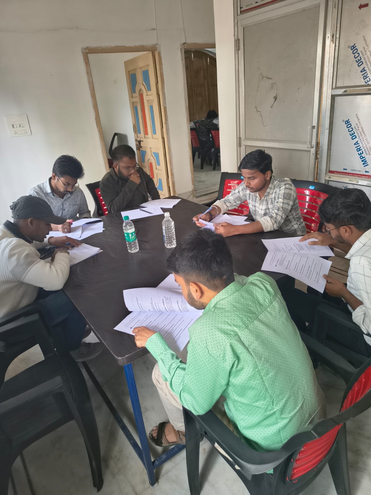 Students attempting a written coding round at Lawazia Tech Dumka office
